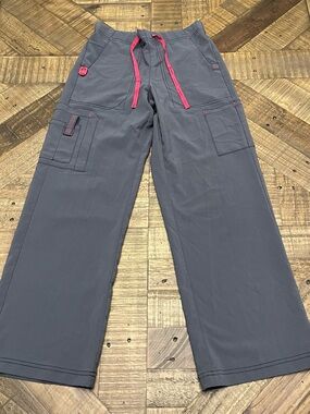 Carhartt Women's Cross-Flex utility boot cut scrub pants in charcoal gray
